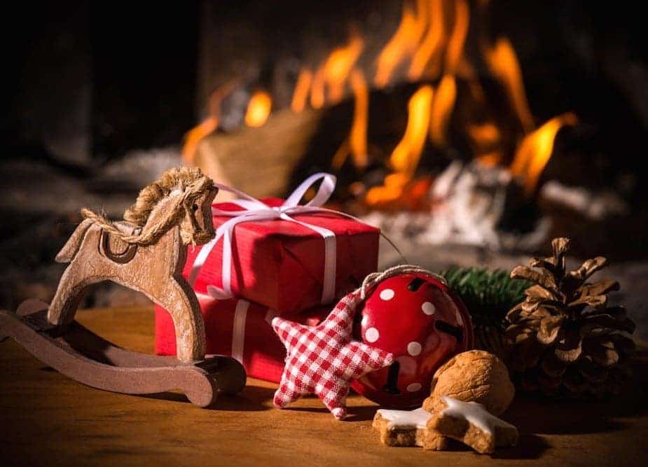 Vintage-Christmas-gifts-in-front-of-a-fireplace.jpg