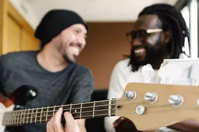 Two musicians working together.