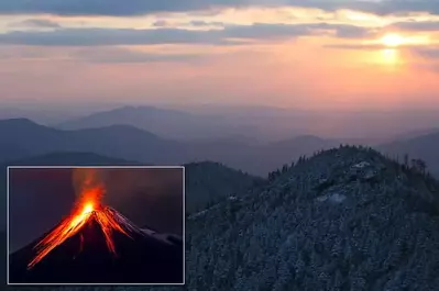 Photo of an erupting volcano embedded in a scenic photo of the Great Smoky Mountains.