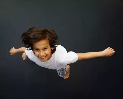 Boy enjoying a trampoline park, one of the indoor things to do in Pigeon Forge.
