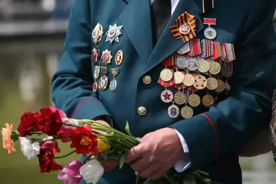 soldier honoring fallen comrads at Veterans Day in the Smoky Mountains