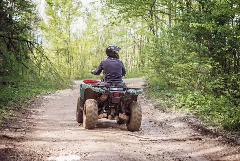 Man,On,The,Atv,Quad,Bike,On,The,Mountains,Road.