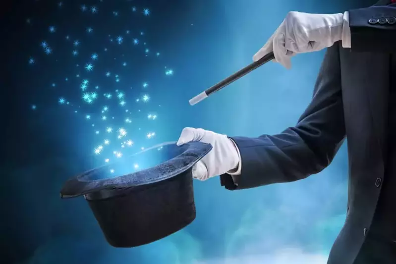magician doing a trick with a hat