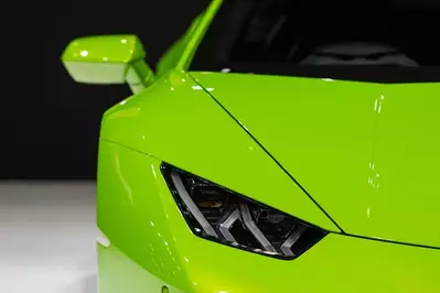 Green exotic car in museum