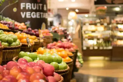 grocery store with apples in barrels