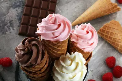 four soft serve ice cream cones
