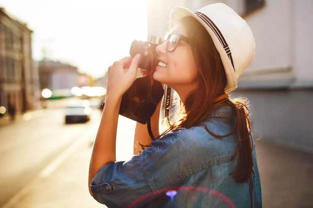 woman takes photo