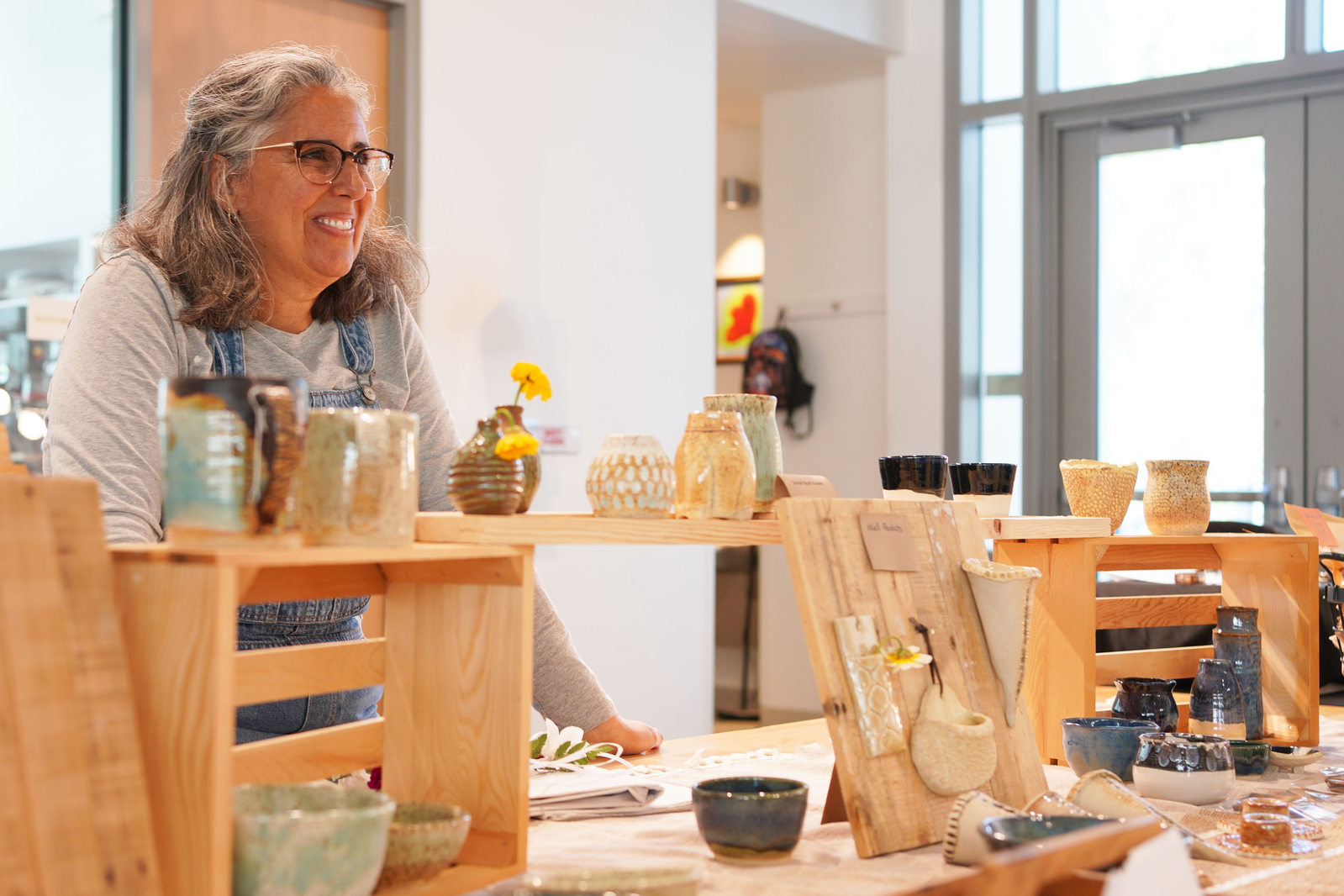 artisan in craft shop