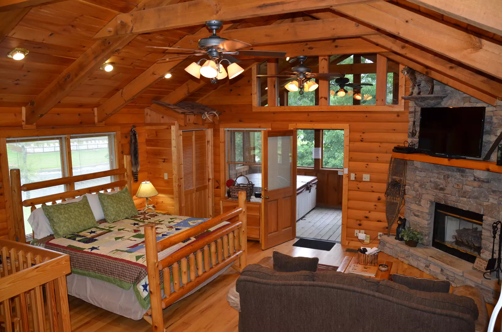 Full kitchen, full bath, living room, washer and dryer, TV and King bed on the top floor