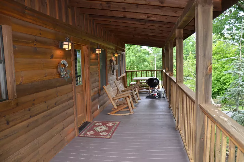 Front deck with wooden rocking chairs