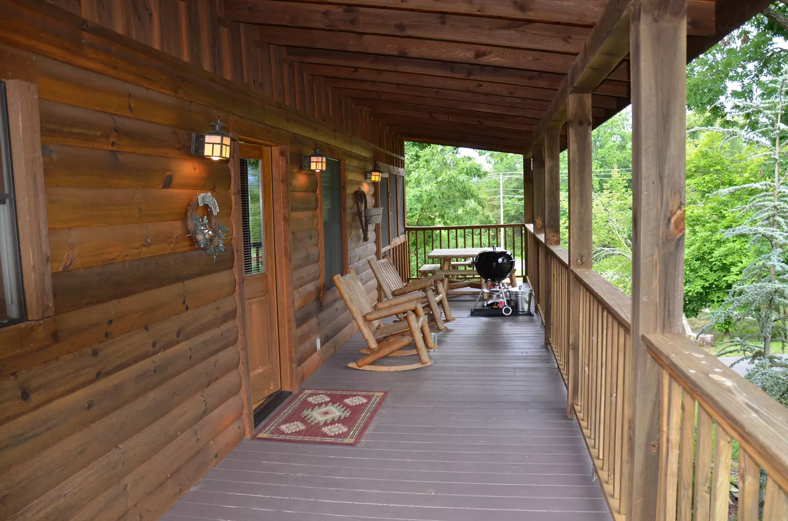 Front deck with wooden rocking chairs
