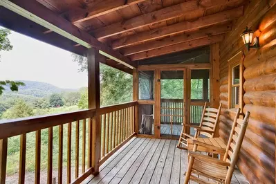 Wooden rocking chairs on the deck to enjoy your morning coffee
