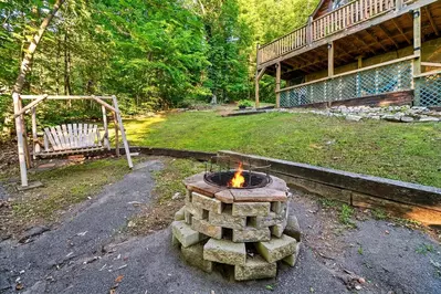 Fire pit with swing (can cook on grill grates)