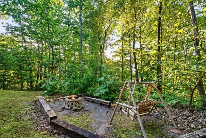 Fire pit with swing (can cook on grill grates)