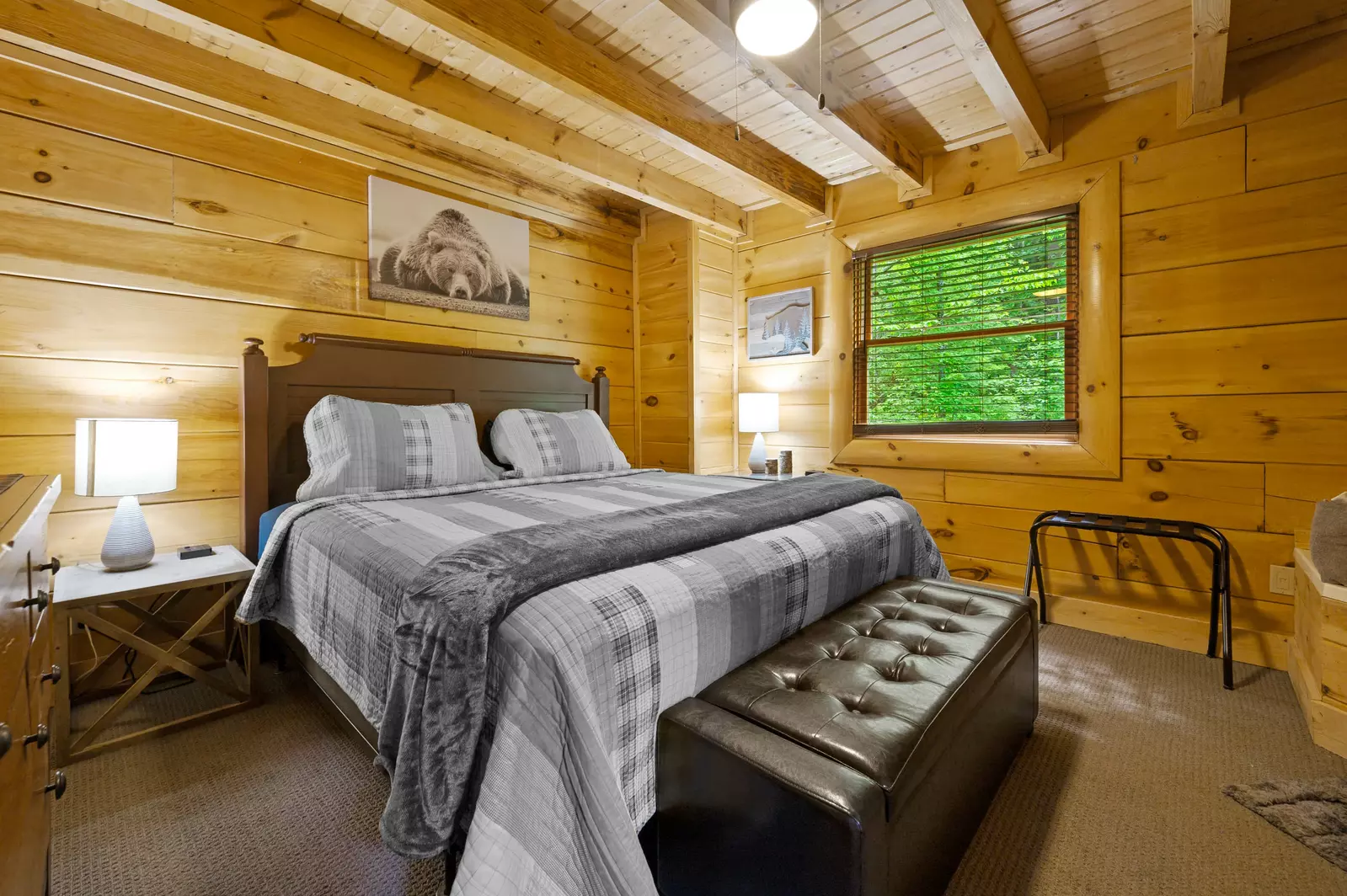 King bed in the front bedroom. Bedroom includes an en-suite bathroom.