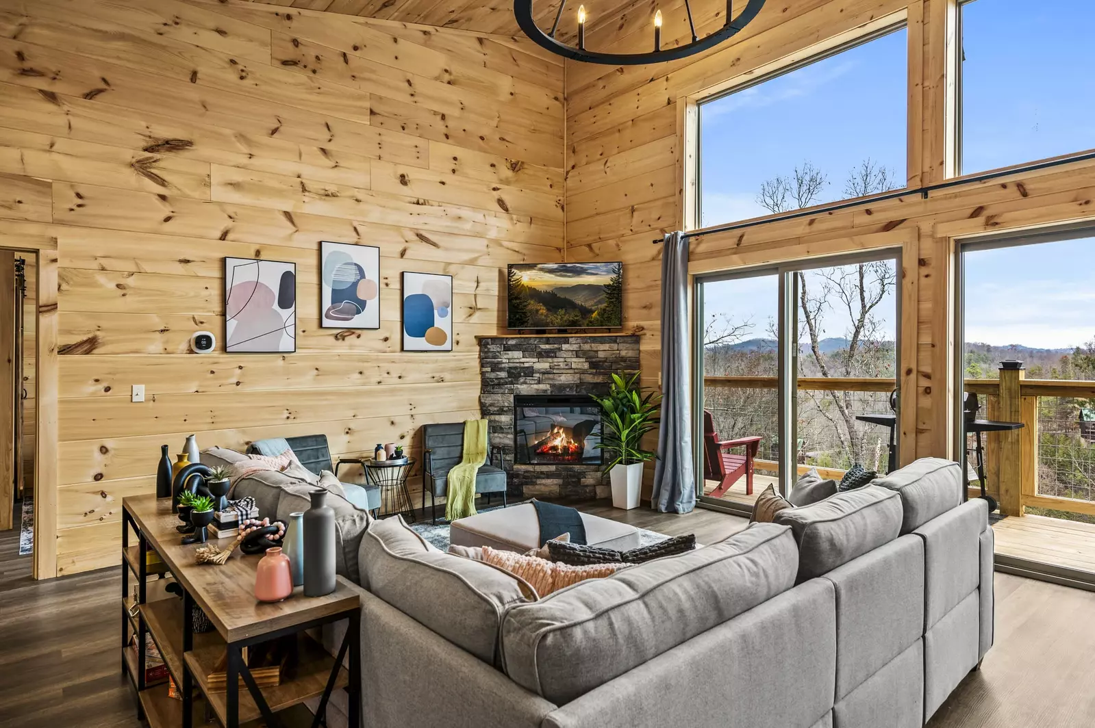 Unwind in the lap of luxury with our living room's panoramic vista. Floor-to-ceiling windows frame with  breathtaking views 🌅