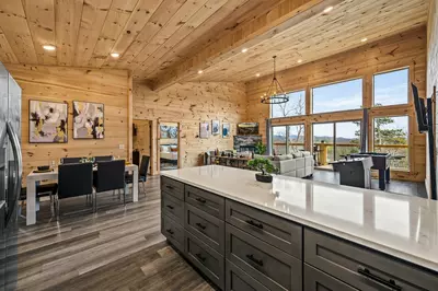 Seamlessly blending living, dining, and kitchen areas, it's an invitation to connectivity, relaxation, and modern living
