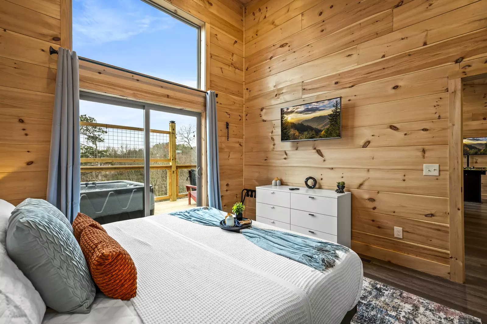 Experience the perfect blend of comfort and entertainment in our bedroom, complete with a smart TV