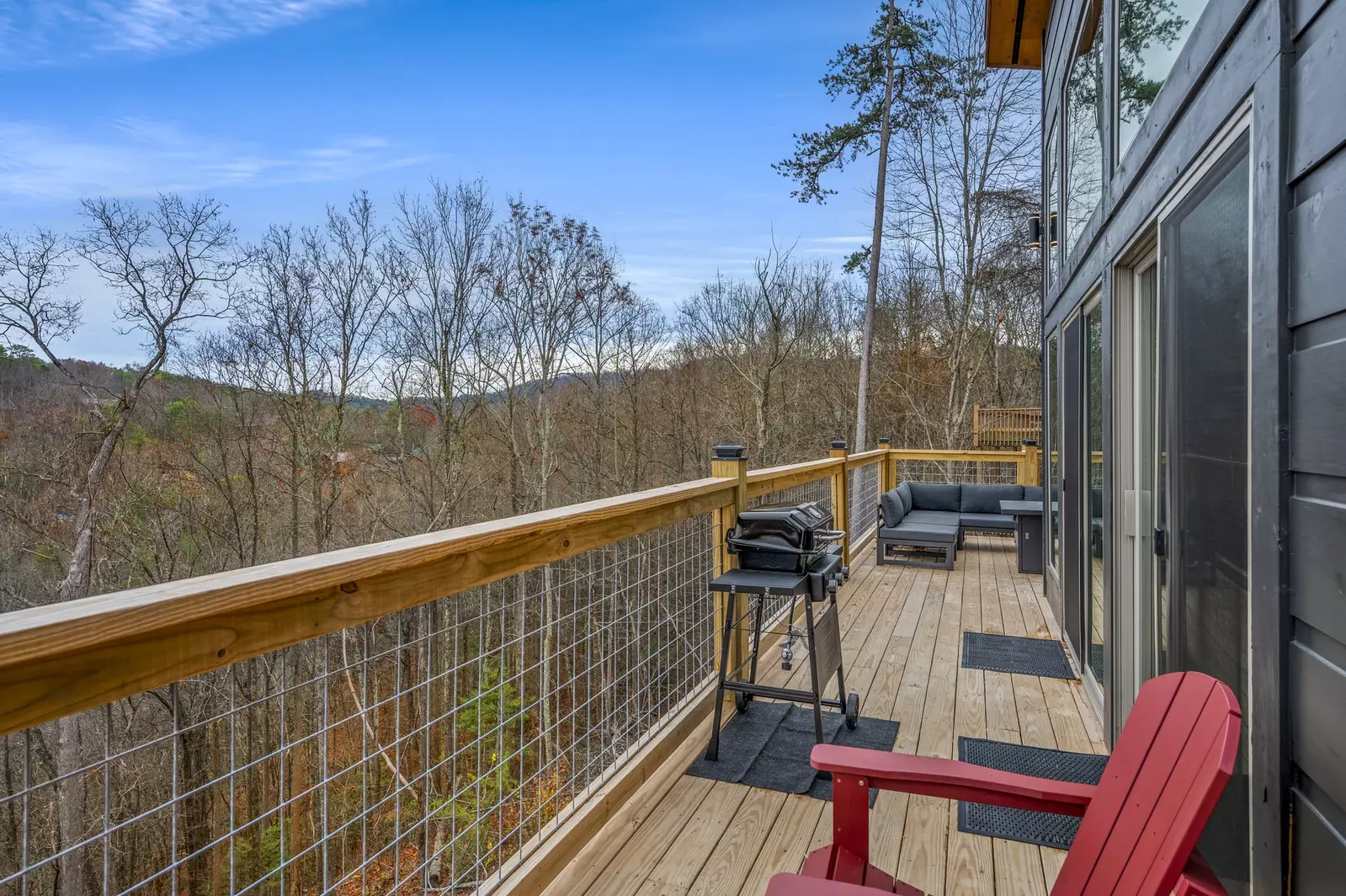 Sizzle with a view! Our deck boasts a grill where you can cook up a storm against a backdrop of panoramic mountain vistas