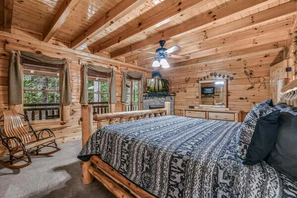 Master bedroom on 1st floor with king size bed