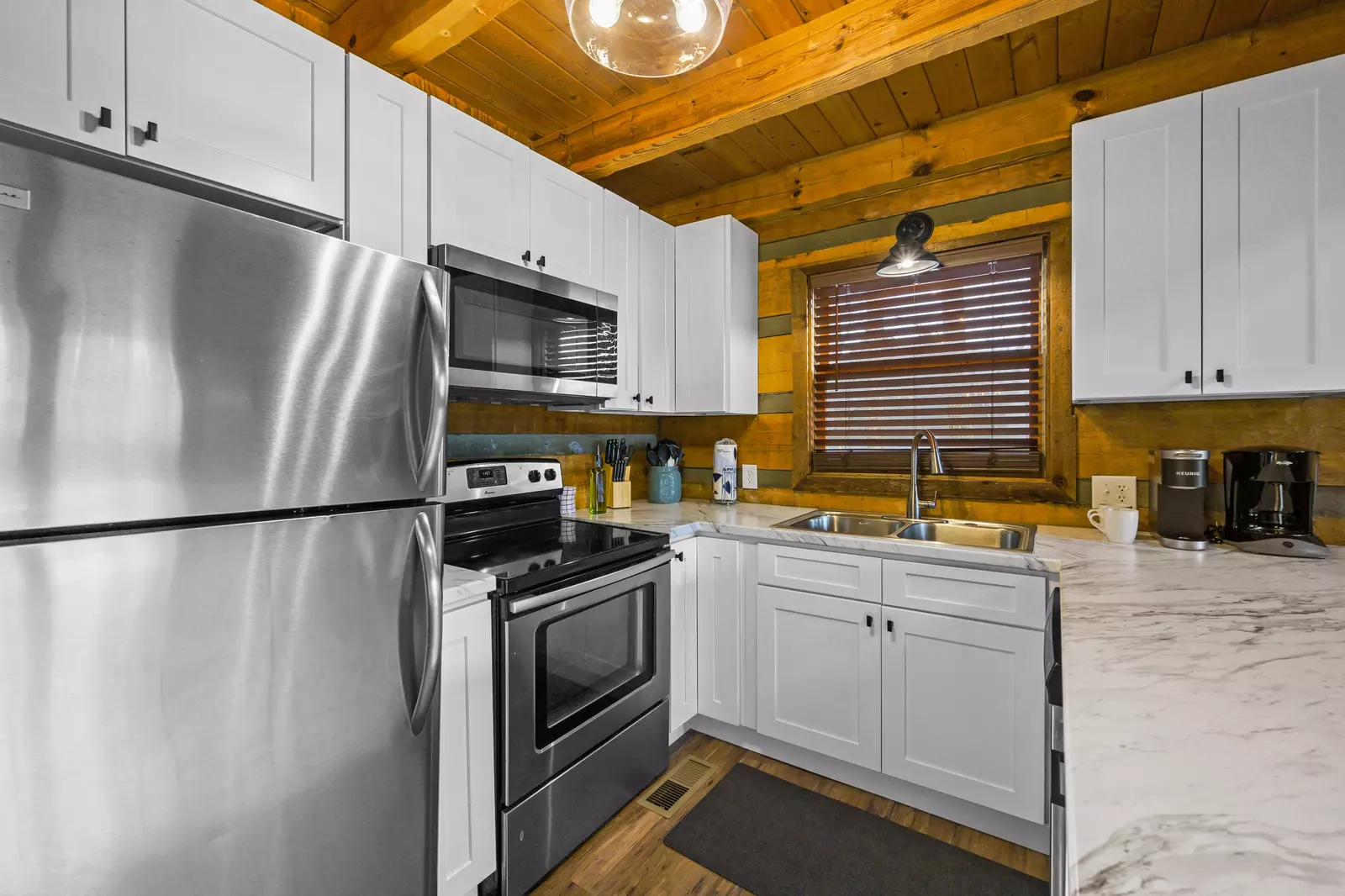 Kitchen with fully stocked cooking and dining utensils!