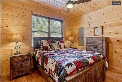 Queen bedroom #1 with TV with streaming and cable