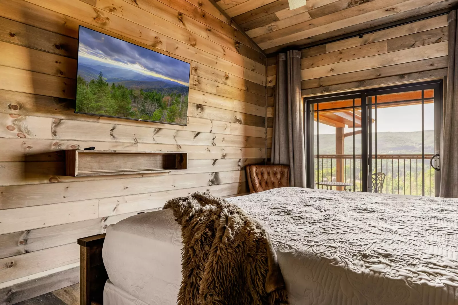 Upstairs level King bedroom with a view.   Private bathroom.