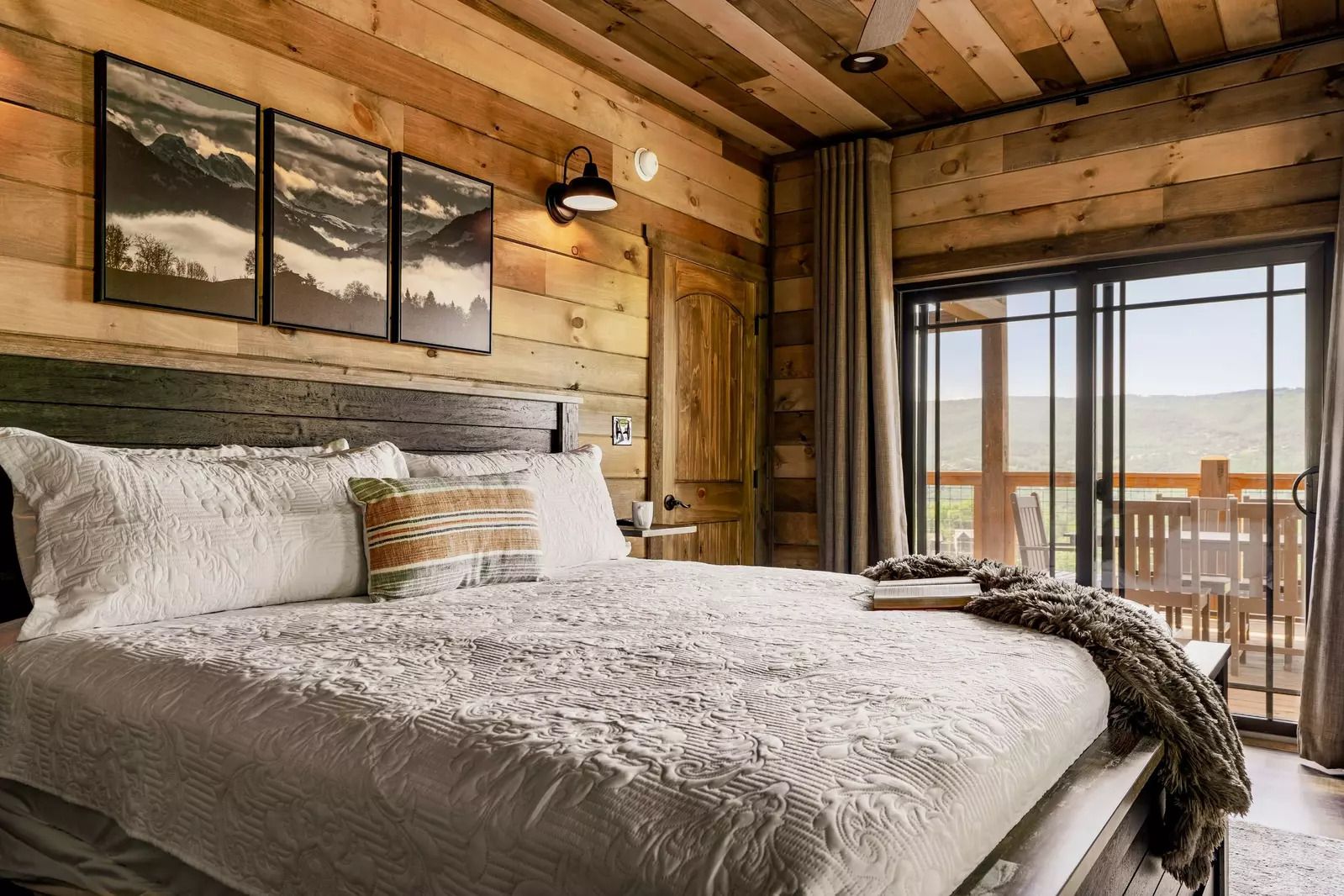 Main level King bedroom with a view. As with all bdrms, it has a pvt bathroom.