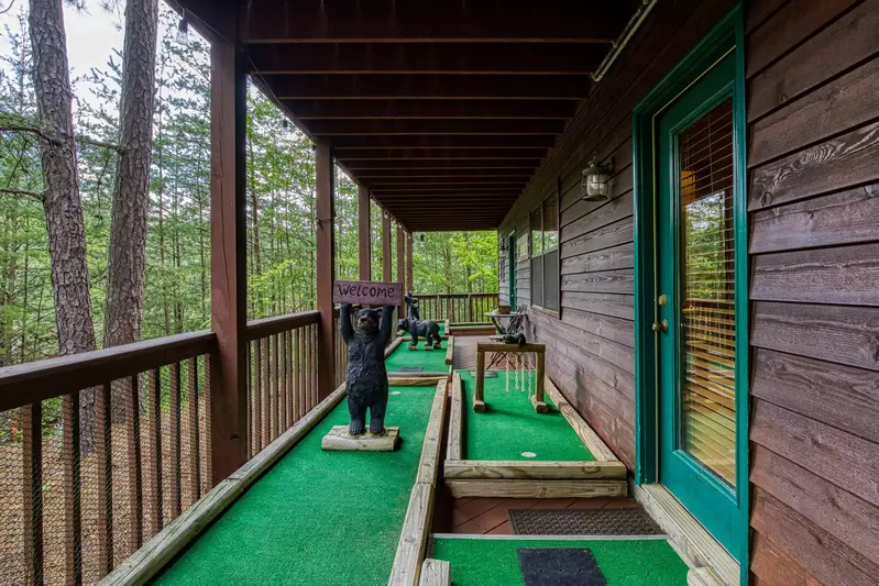 A Beary Good Time lower level deck with putt putt course