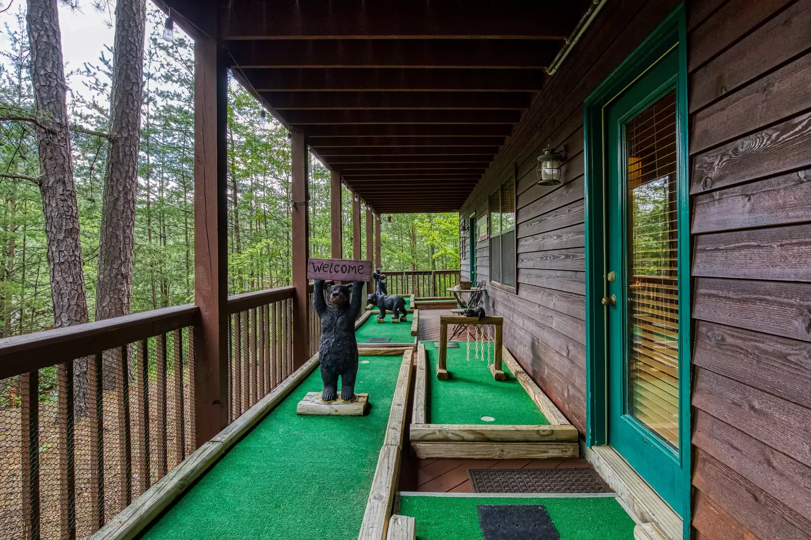 A Beary Good Time lower level deck with putt putt course