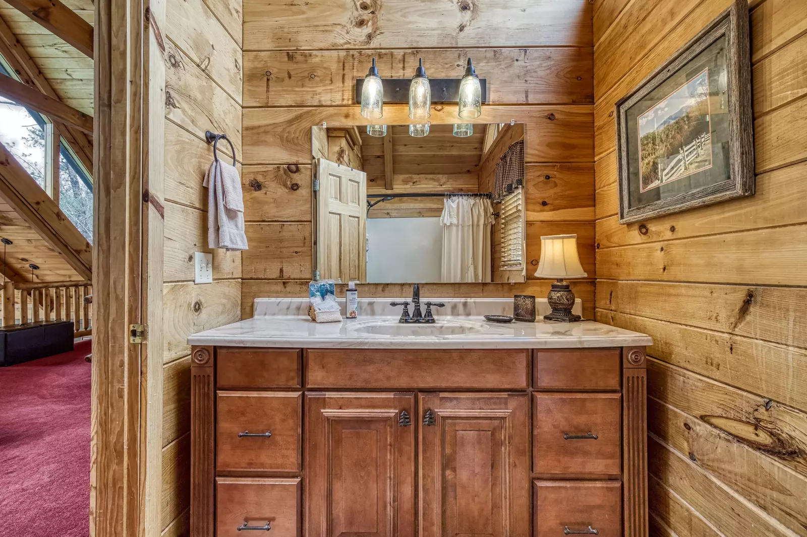 A Walk in the Clouds bathroom with single vanity