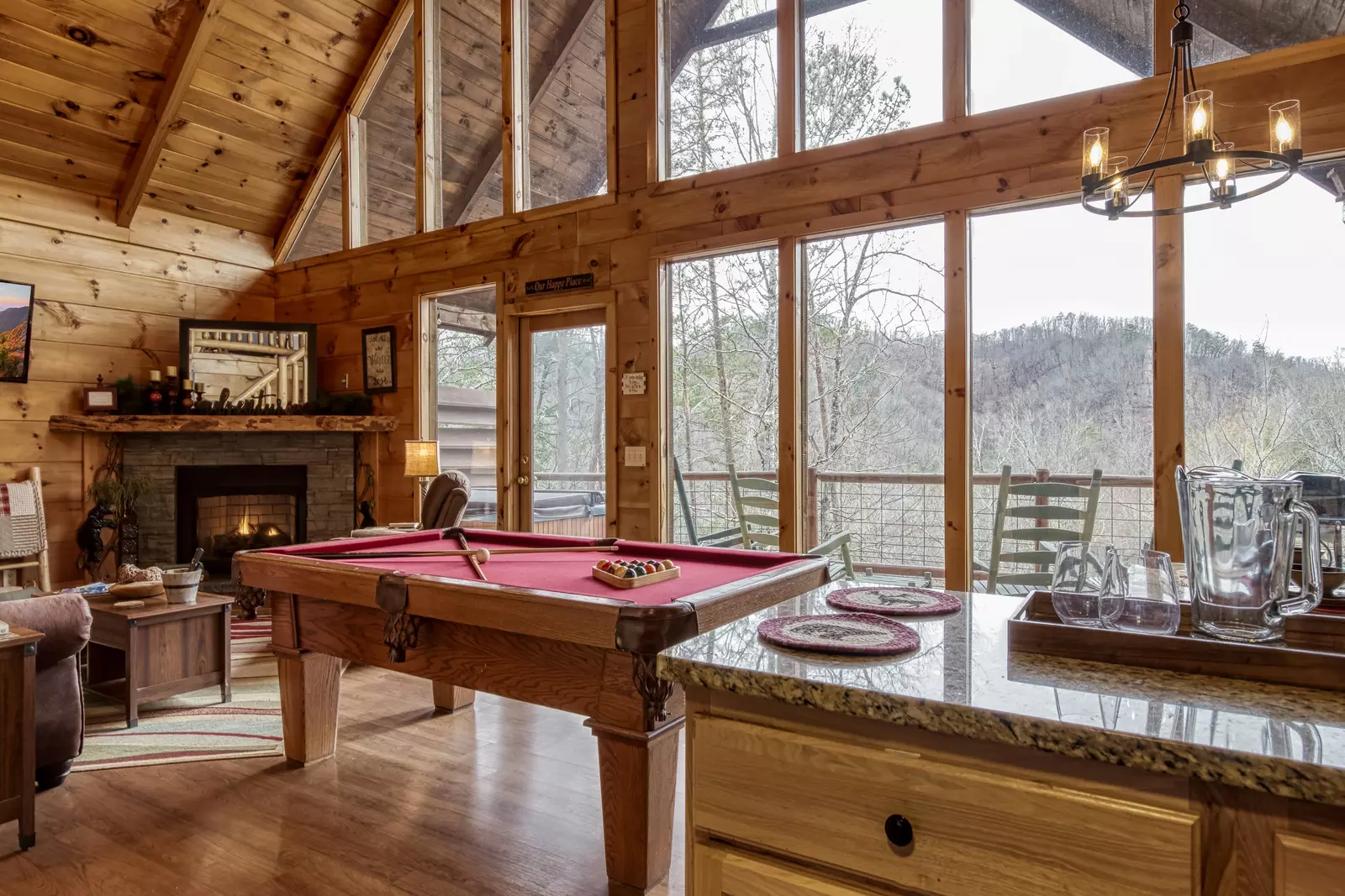 A Walk in the Clouds pool table and floor to ceiling windows