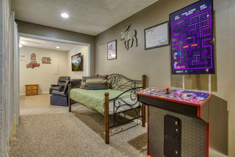 Amazing Grace lower level game area with day bed