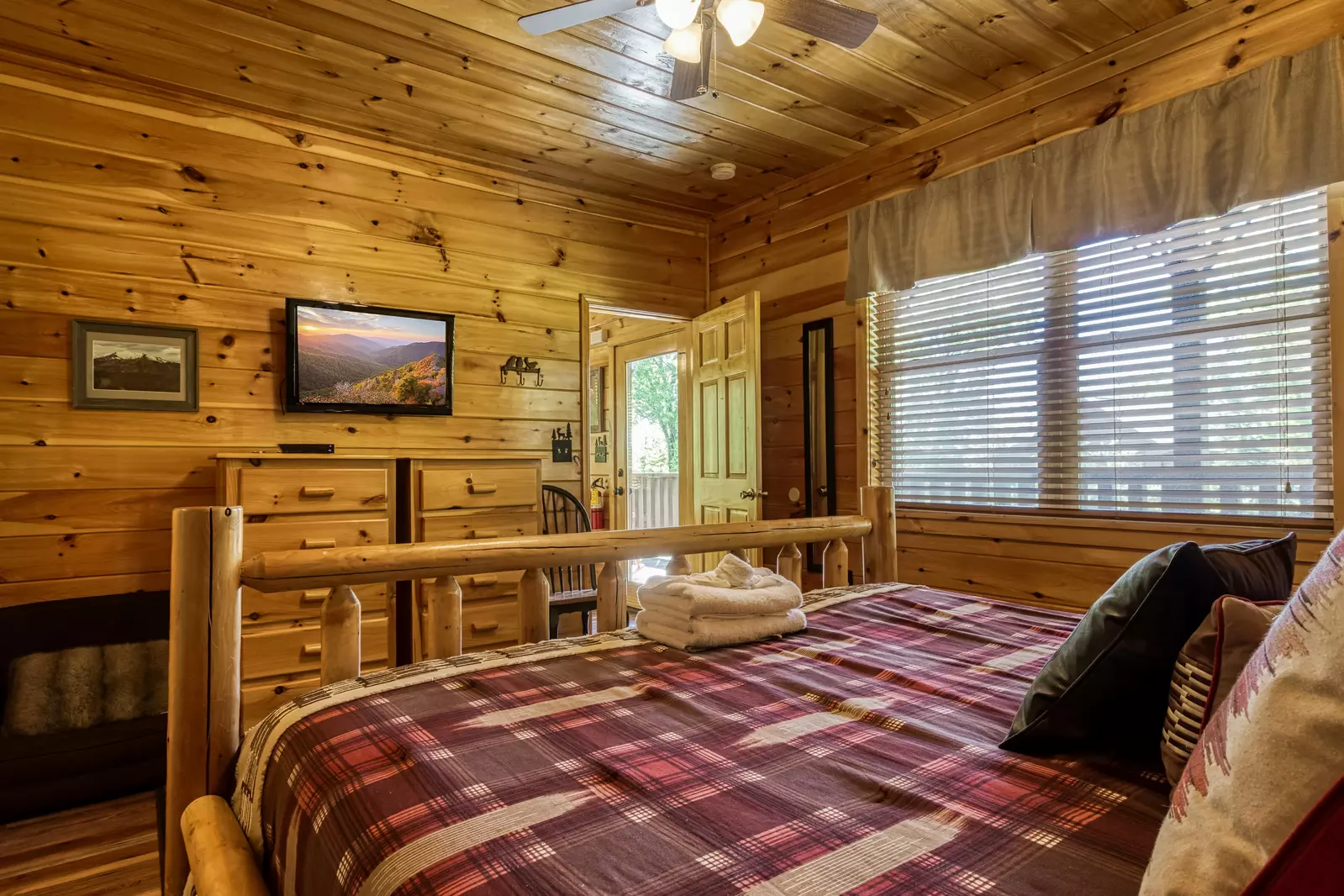 Antler Run second floor bedroom one with king size bed and flat screen TV