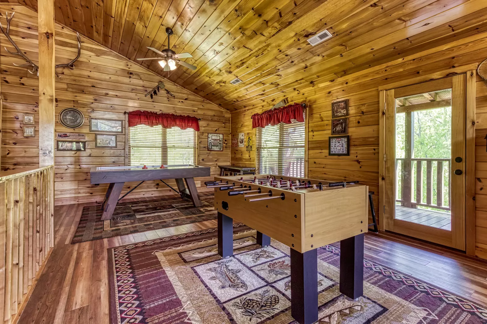 Antler Run third floor game room with foosball table and air hockey table