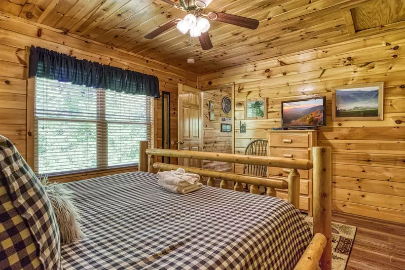 Antler Run third floor bedroom two with king size bed and flat screen TV
