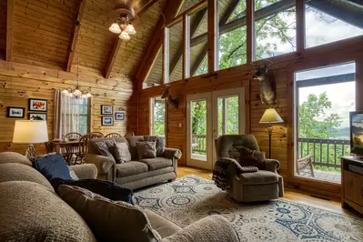 Awesome View living room with floor to ceiling windows