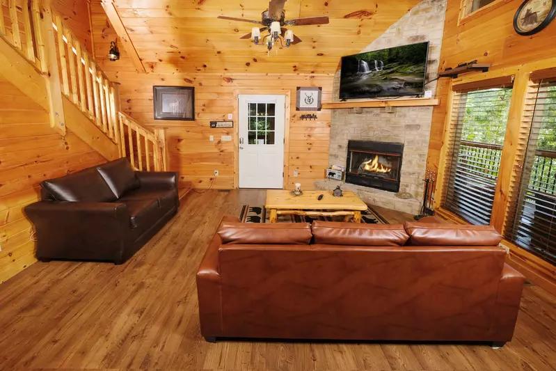 Bearadise Mountain Lodge living room with wood burning fireplace