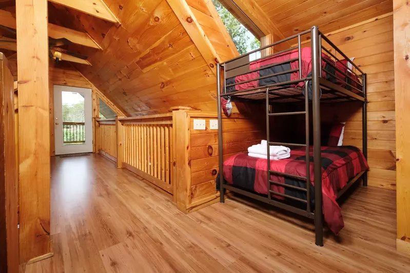 Bearadise Mountain Lodge upper level loft area with bunk beds