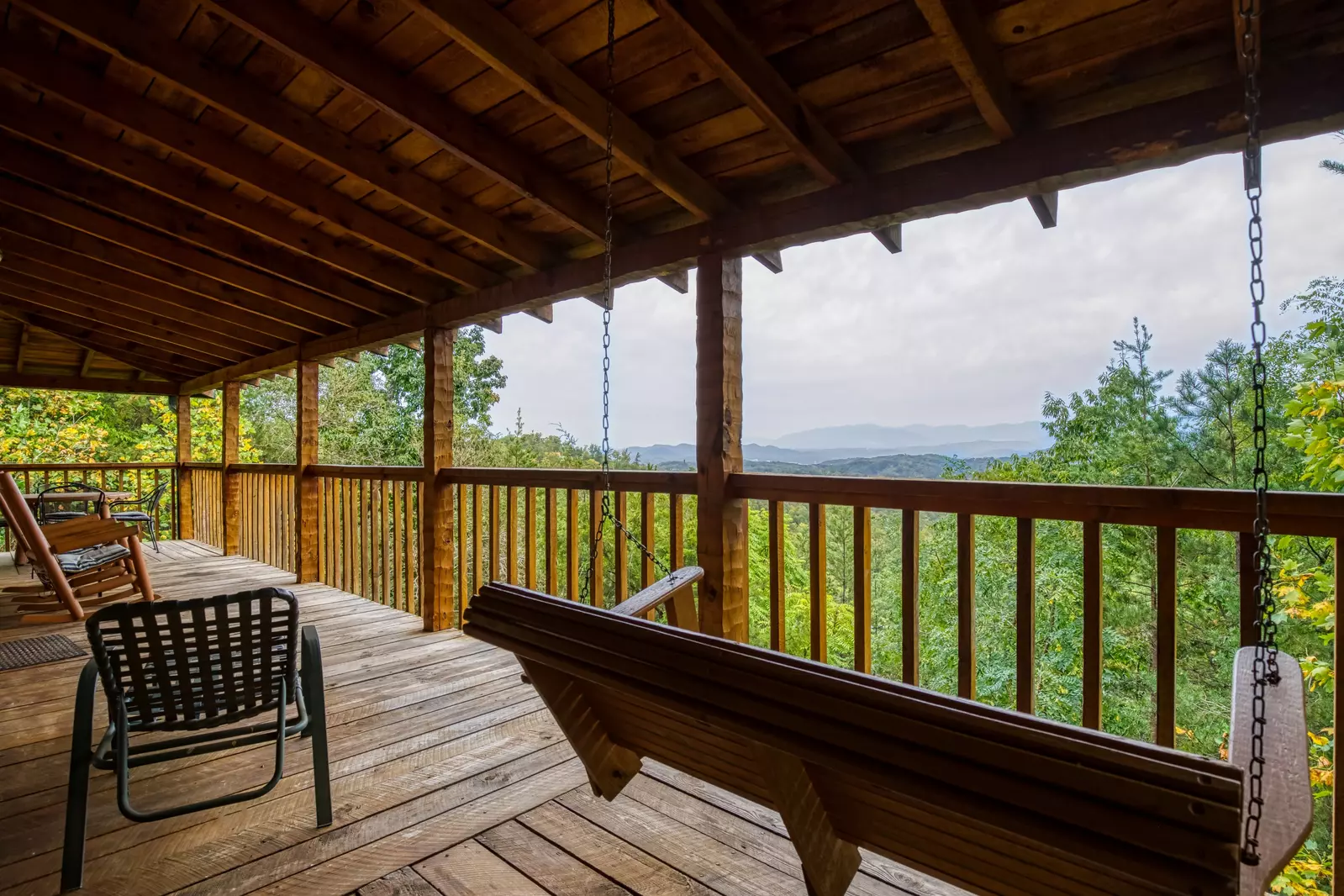 Buck Naked wrap around deck with swing