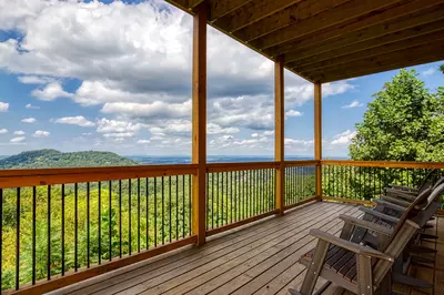 Chasing Views covered back deck with rocking chairs