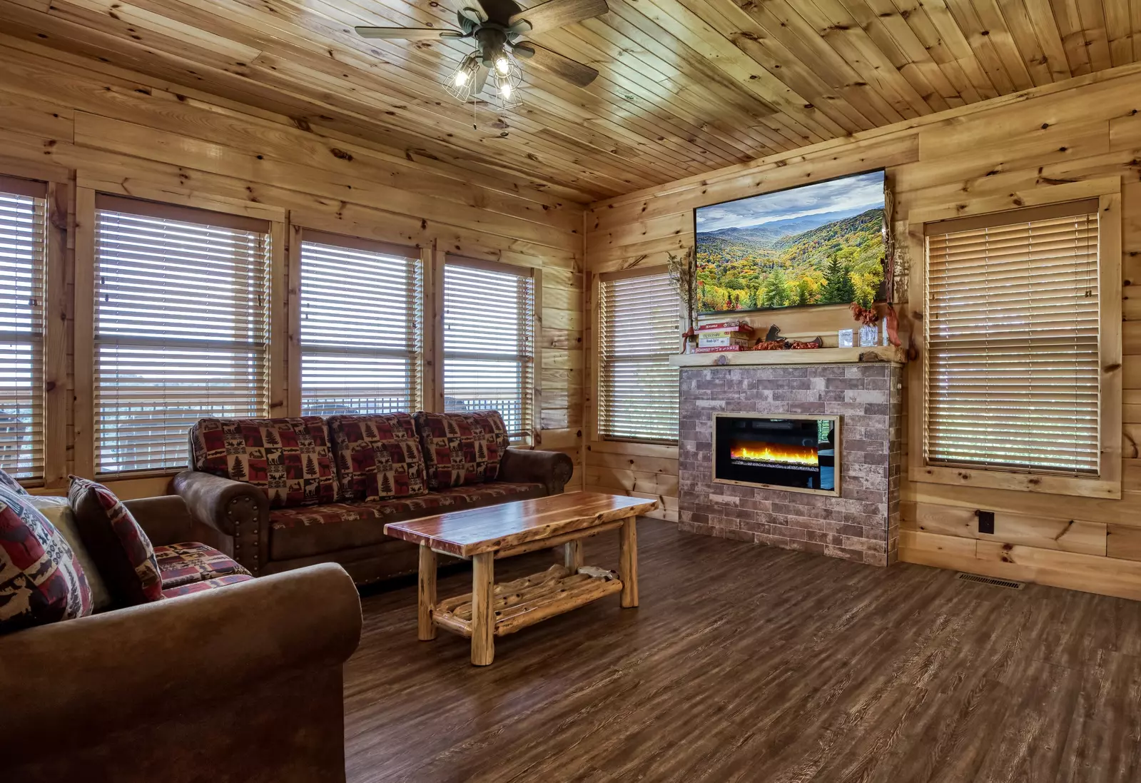 Chasing Views living room with electric fireplace