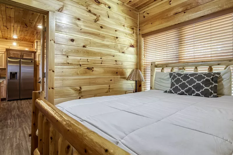 Chasing Views main level bedroom with queen size bed