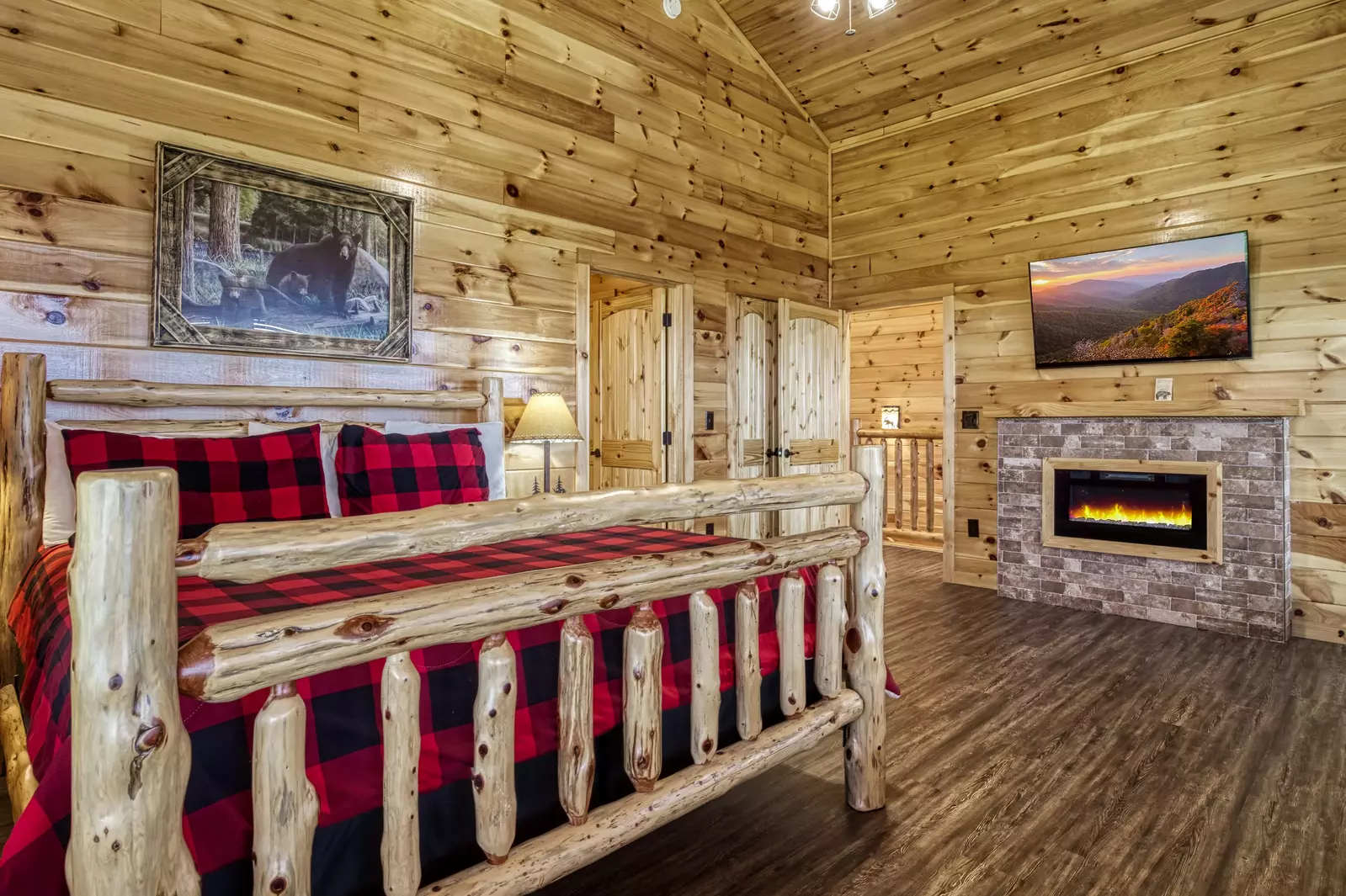 Chasing Views upper level bedroom with electric fireplace