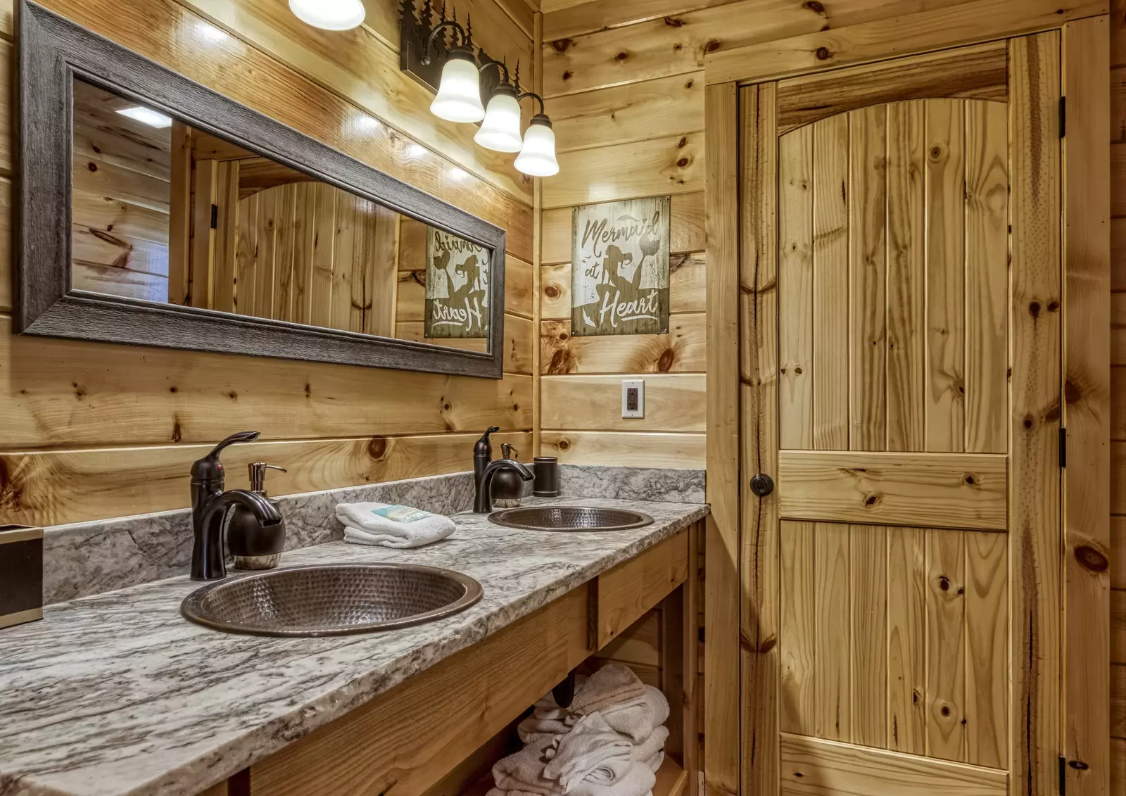 Chasing Views upper level bathroom with double vanity