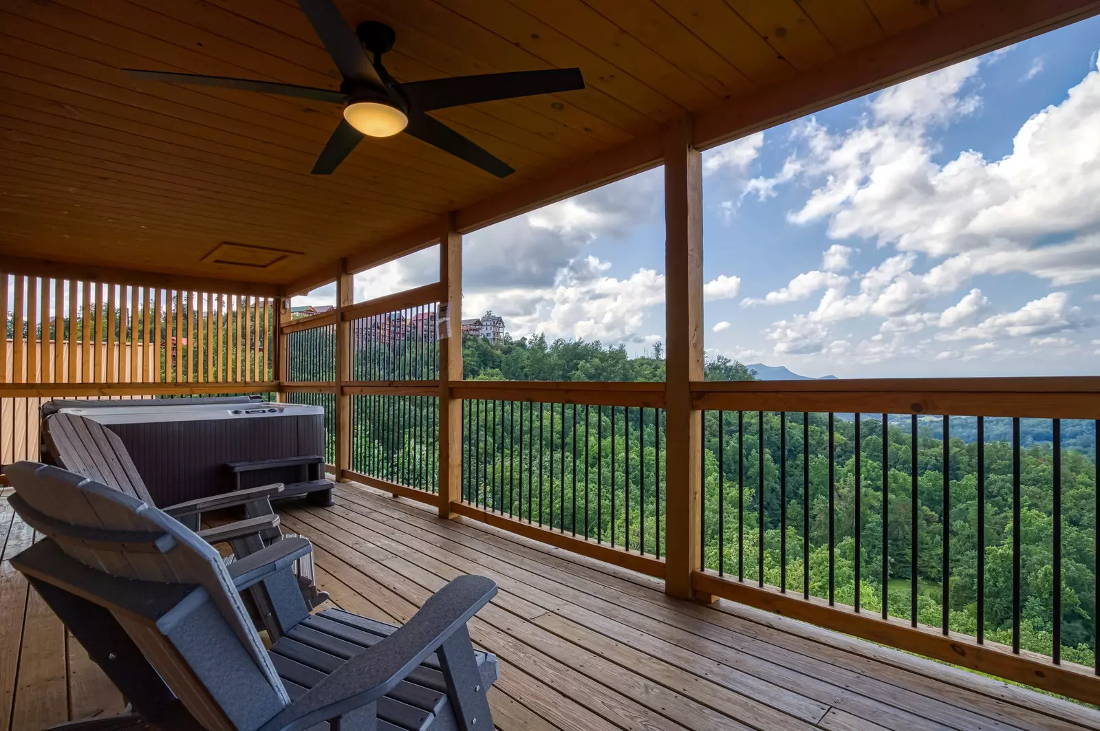 Chasing Views covered back deck with hot tub