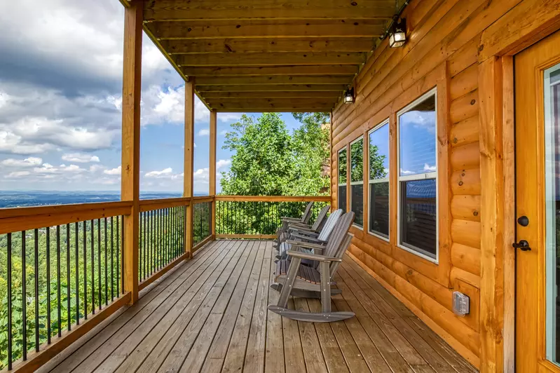 Chasing Views covered back deck with rocking chairs