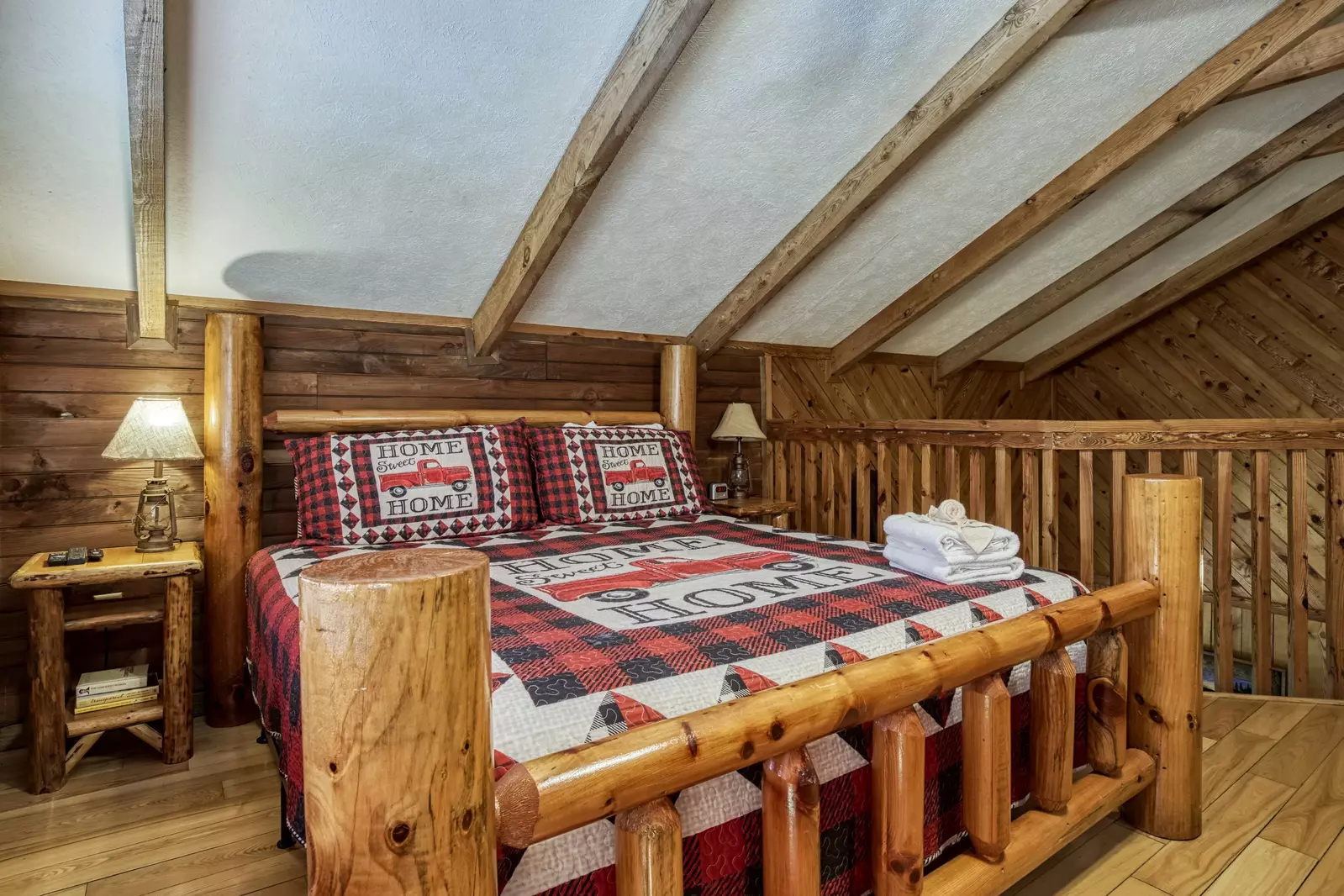 Country Charm upper level bedroom with king size bed