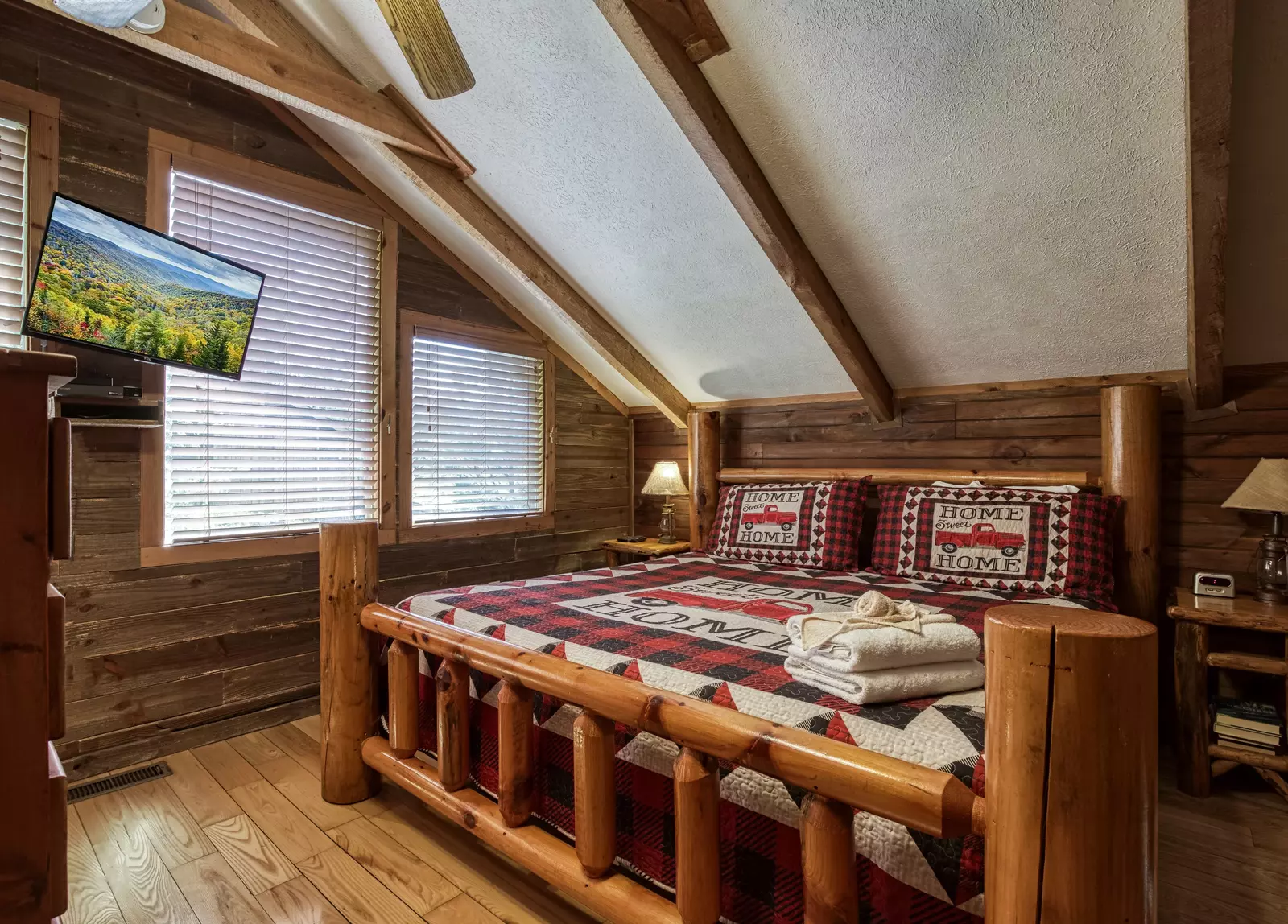Country Charm upper level bedroom with king size bed