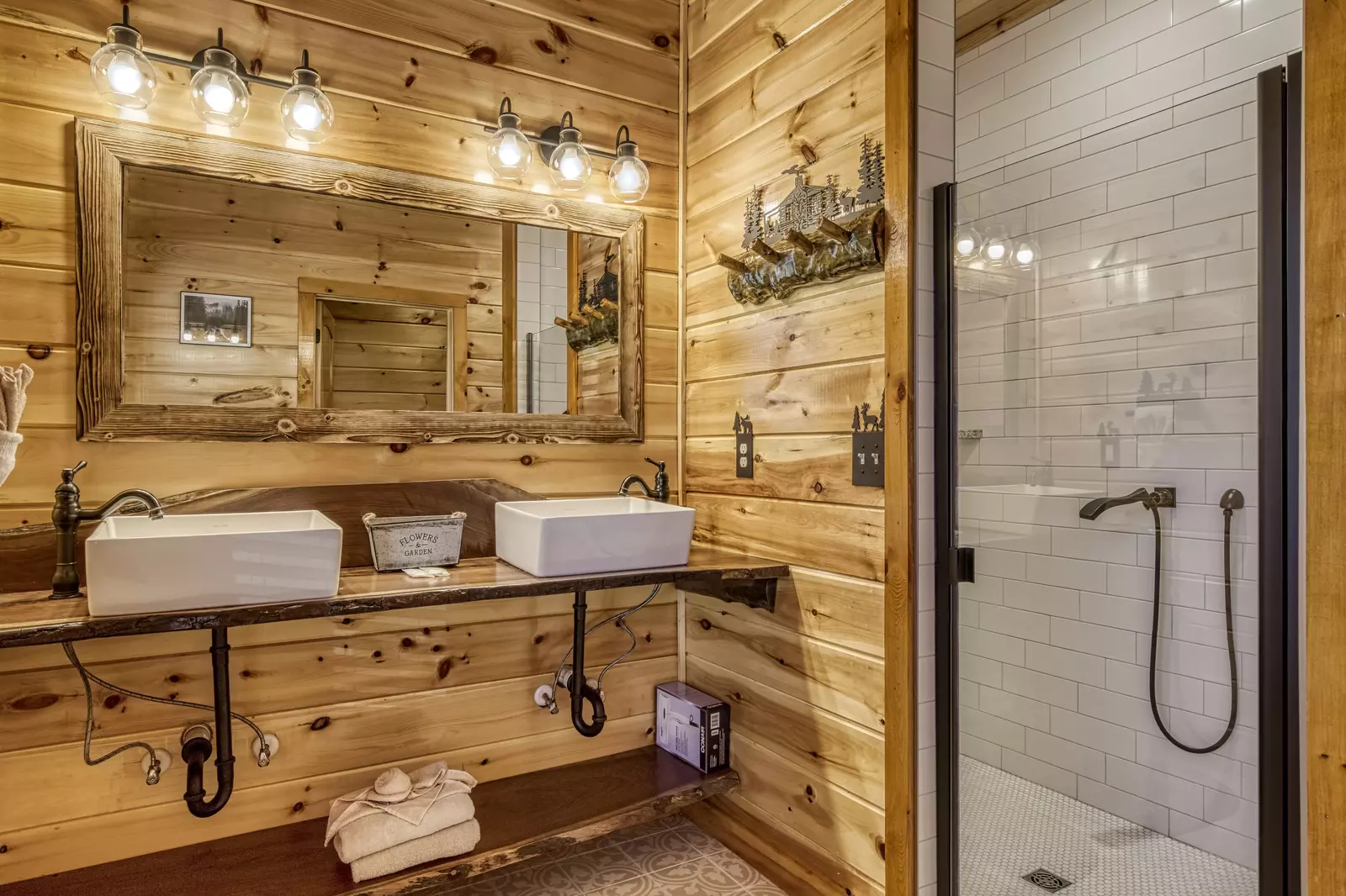 Cozy Cub Cabin main level bathroom with walk in shower